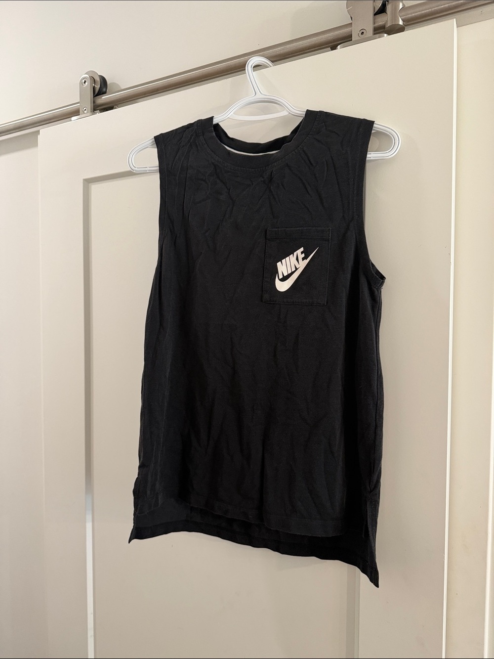 Nike women's Black Tank with White Swoosh Pocket
